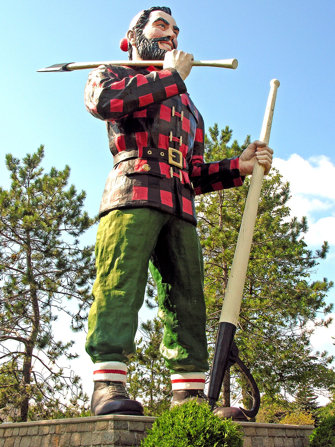 The towering painted Paul Bunyan statue holding an axe in Bangor, Maine