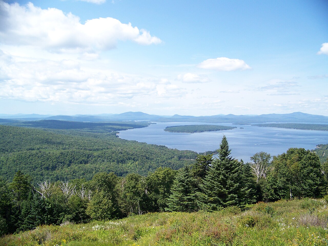 Panoramic view over Mooselookmeguntic Lake and forested mountains from Height of Land, Rangeley, Maine