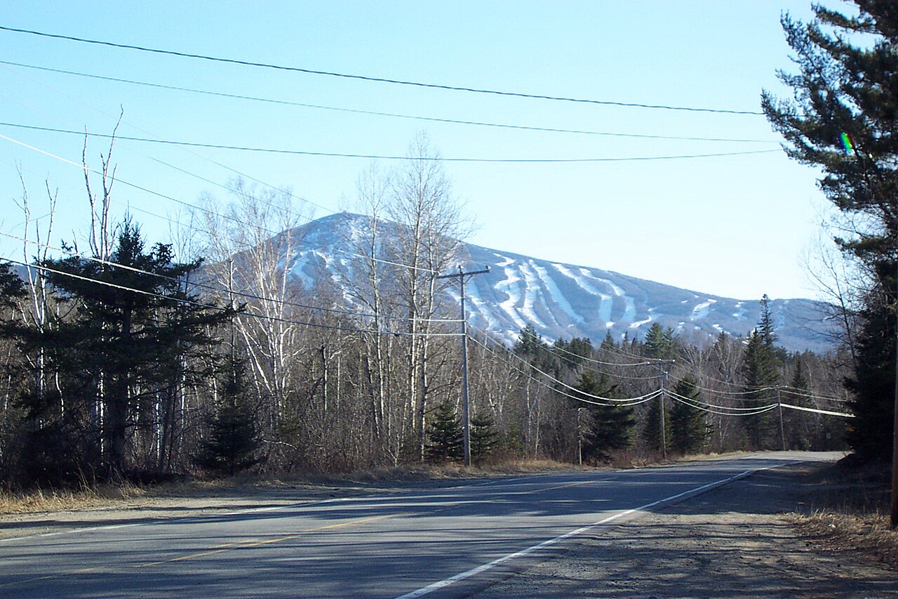 Sugarloaf Mountain with its ski trails, seen from the road north of Kingfield, Maine